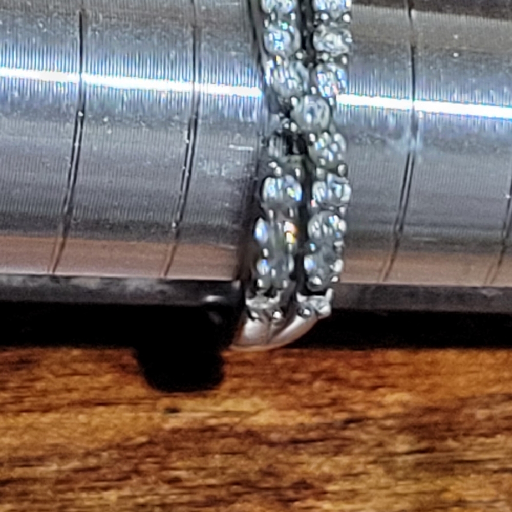 W. Kruk Polish Sterling Wedding band ( 3 stones missing)